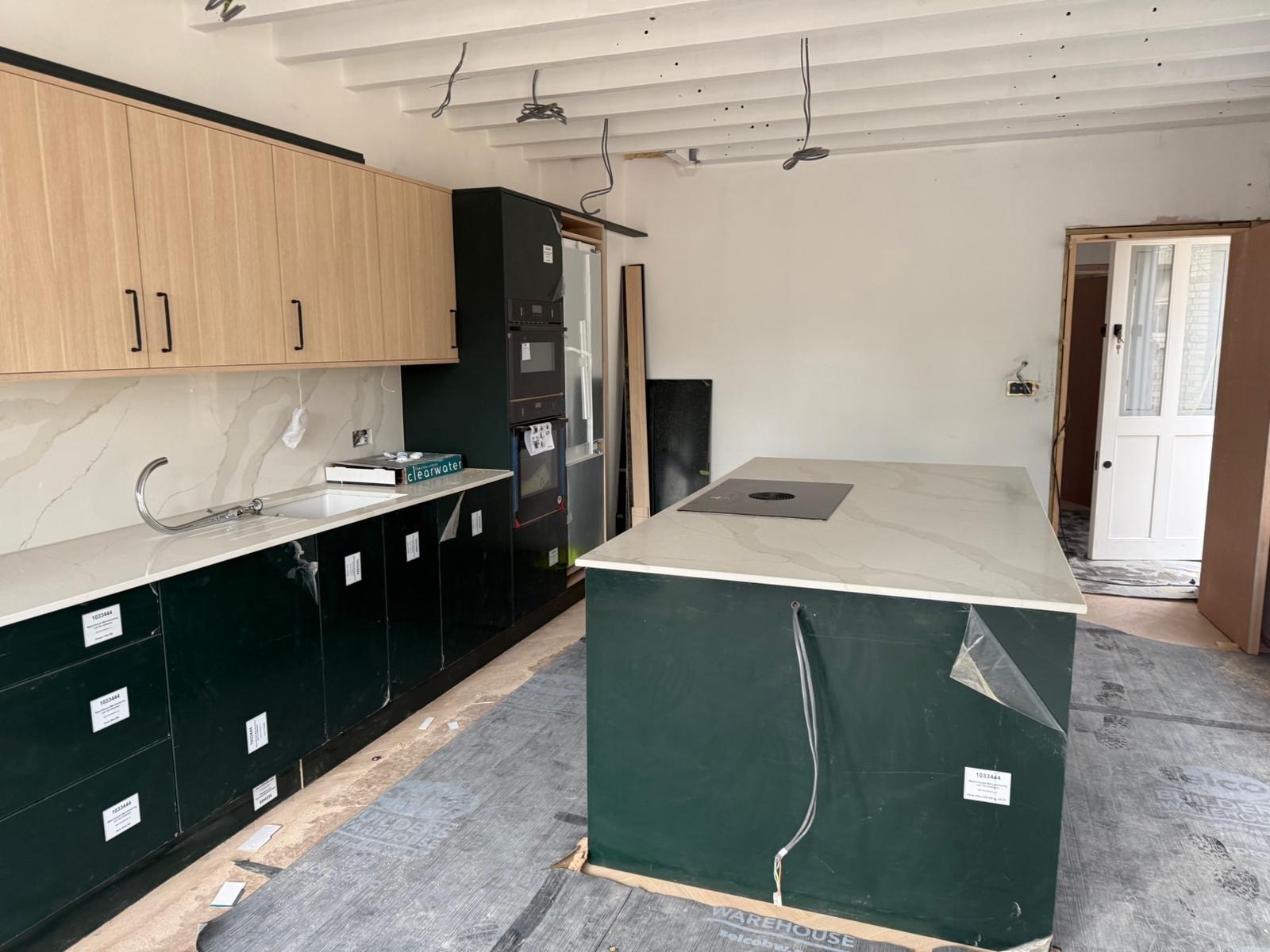 Kitchen installation before final fittings · July 2025