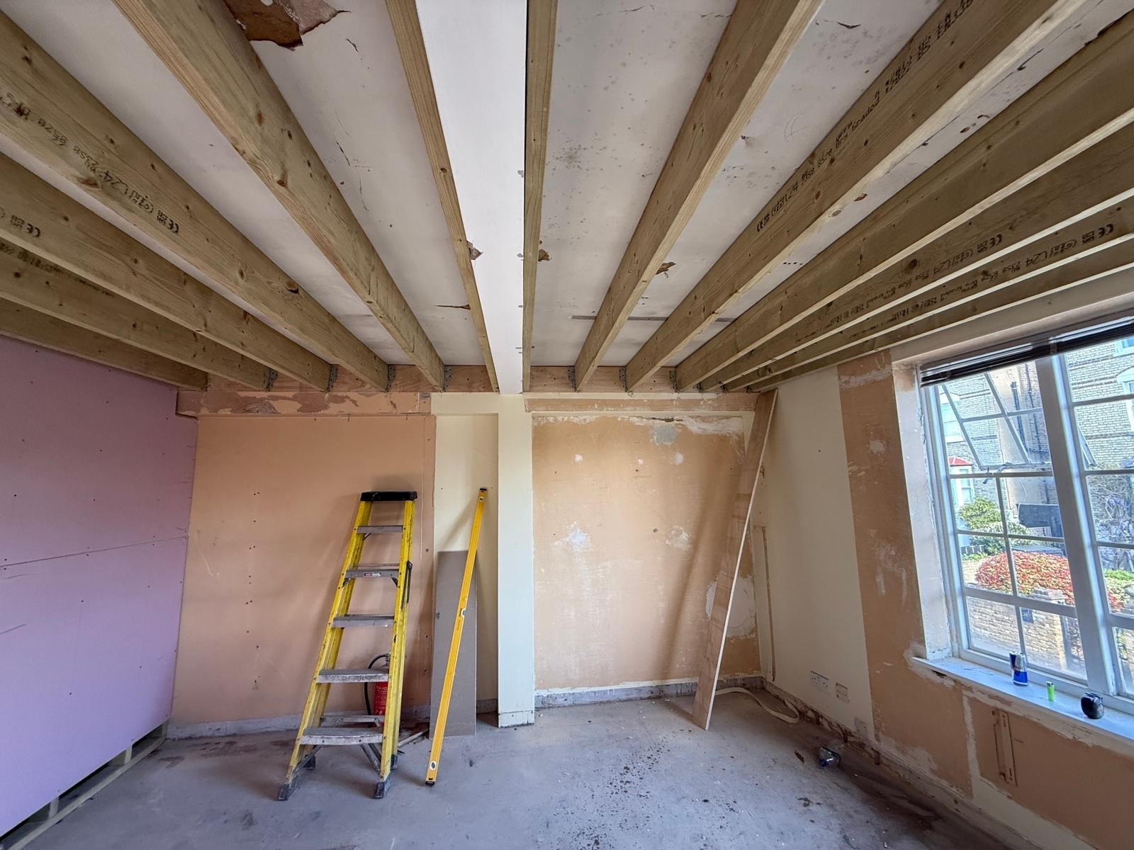 Ceiling beams and wall preparation · April 2025