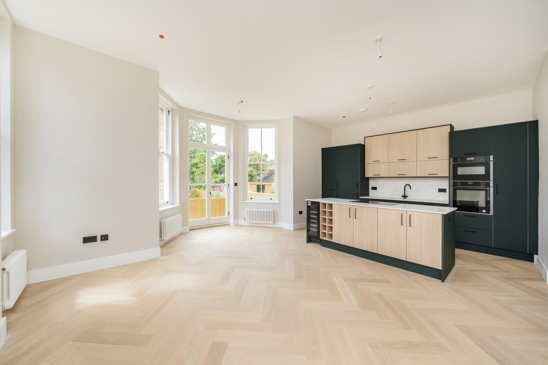COMPLETED · Bay-window living space, July 2026