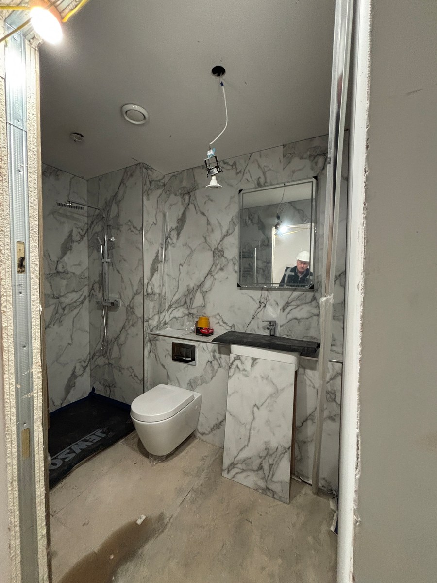 Bathroom installation during the conversion · Richard Diamond / EdenCoast, 1 April 2025